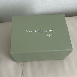 Van Cleef and Arpels gift box with ribbon
